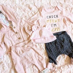 2 Carter's newborn outfits